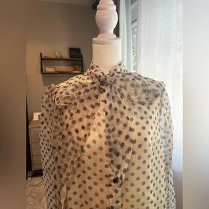 Black and white polkadot, bow button up front long sleeve.